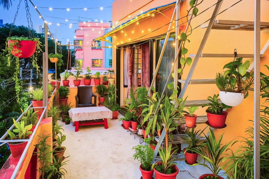 Tollygunge House | ac room with kitchen and Terrace