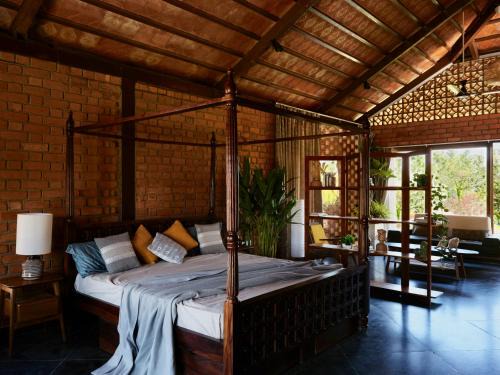 Ibrahimpatan House | Atmos Coquitos, Kerala themed manduva courtyard