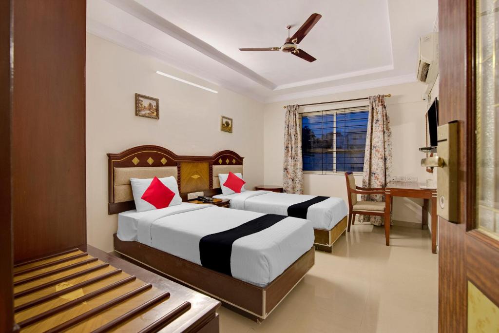 Jayanagar Hotel | Capital O Elegant Amethyst Business Hotel Near Ragigudda Sri Prasanna Anjaneyaswamy Temple