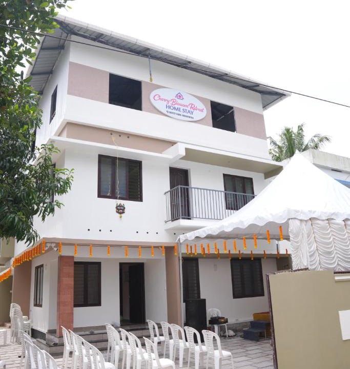 Kollam House | Cherry Blossom Retreat