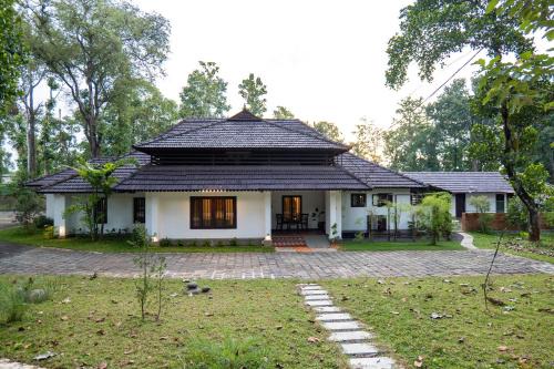 Kothamangalam Villa | ELIVAAS Signature Tales By Tamarind 200 Year-Old 3 BHK Forest Villa with Pvt Pool, Garden, Gazebo, Backyard & Open-Air Shower Courtyard