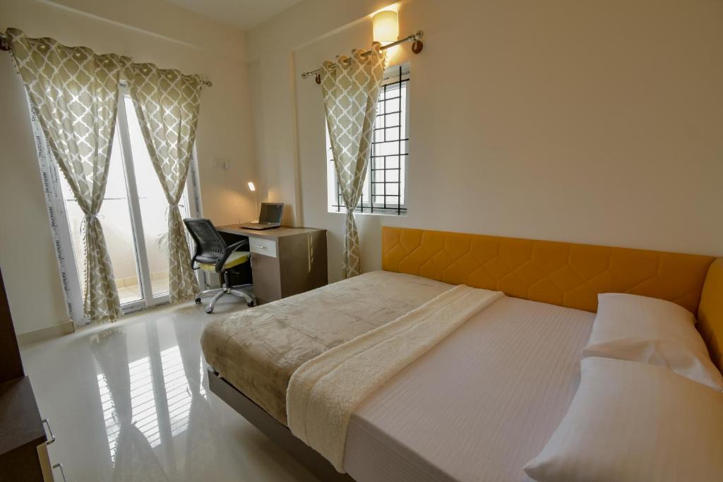 Palm Meadows Apartment | HomeSlice Whitefield - 1BHK, 2BHK Service Apartment