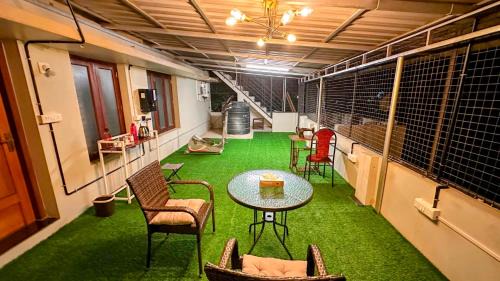Pattom House | Room with Patio at LIC Pattom in a Garden Home Pennyvilla
