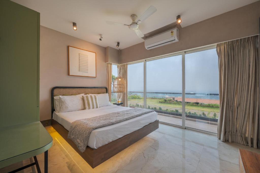 Harnai Villa | SaffronStays Nautica - 5BR hilltop villa with rooftop pool, sea views & modern interiors surrounded by greenery