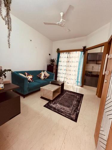 Palm Meadows Apartment | Tranquil 1BHK - Ideal for Couples & Travellers