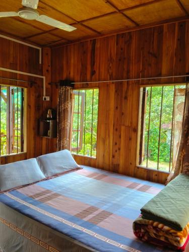 Mawlynnong House | Travellers Hut Homestay Mawlynnong l Blossom Garden