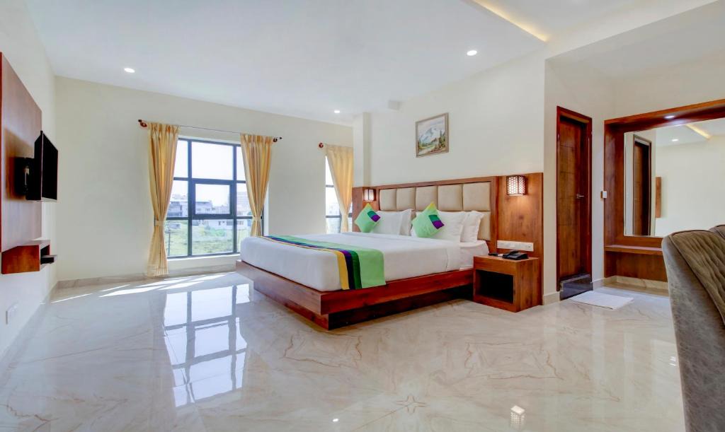Chikkamagaluru Hotel | Treebo The Meridian, 10 Mins To Mahatma Gandhi Park