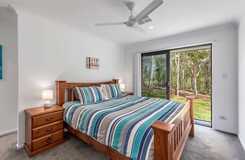Dakabin House | A tranquil bushland retreat with KB, Ducted AC and access to a heated pool.