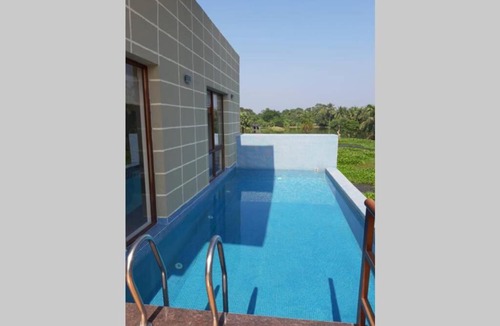 Vedic Village Villa | Aqua Golf Villa in Vedic Village Resort