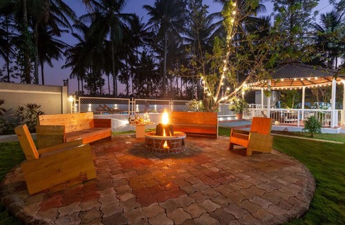 Kushalnagar Villa | Bask In The Greens by StayVista - 4BHK Pet-Friendly Villa with Home Theatre