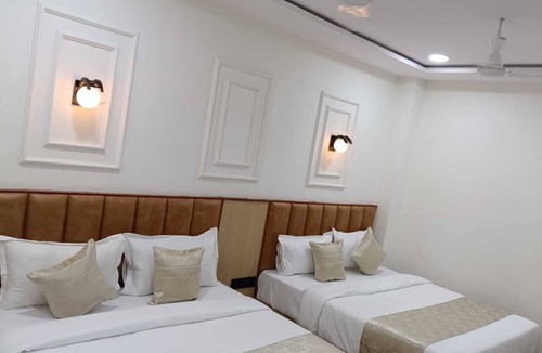 Ahmedabad Hotel | bedroom hotel in beautiful Ahmedabad with cool AC rooms