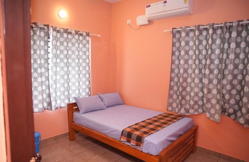 Kollam House | Cherry Blossom Retreat