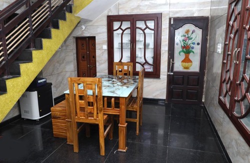 Kollam House | Cherry Blossom Retreat