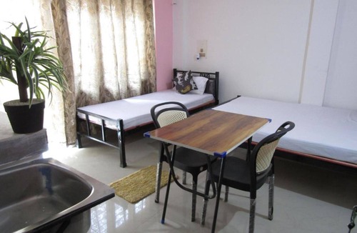 Gauhati House | Cozy Home offers a warm embrace to weary travelers seeking a home away from home
