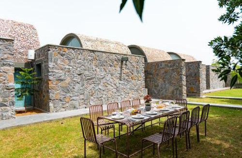 Rajawas Villa | ELIVAAS Signature Stone Age home 4-BHK Stone-Clad Villa with Private Pool, Terrace Garden & Gazebo