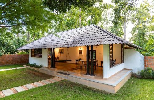 Kothamangalam Villa | ELIVAAS Signature Tales By Tamarind 200 Year-Old 3 BHK Forest Villa with Pvt Pool, Garden, Gazebo, Backyard & Open-Air Shower Courtyard