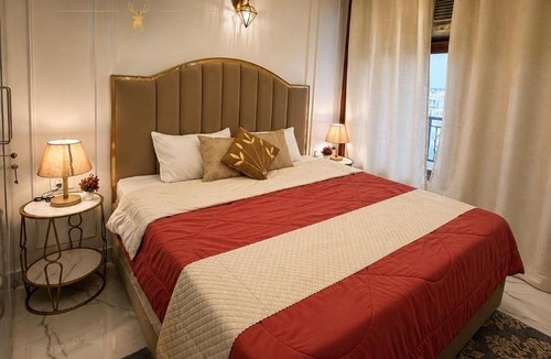 Sainik Farm Apartment | Golden Eclipse Luxury Stays