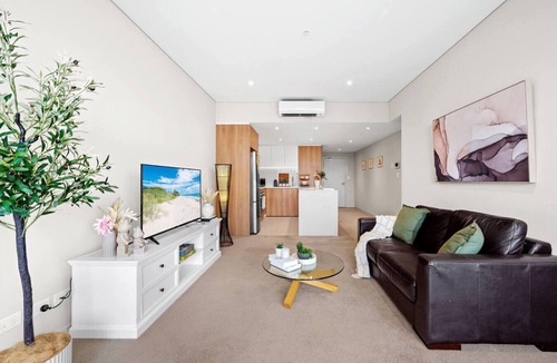Wentworth Point Apartment | High-Rise Haven with Spectacular Skyline Views
