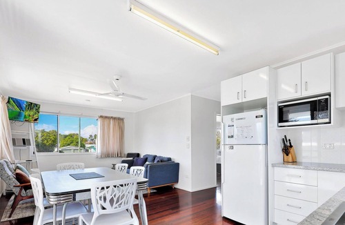Woodgate House | Highset one street back from the beach