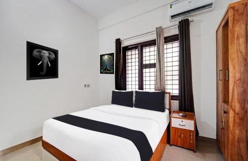 Kozhikode Hotel | Hotel O West Hill near Mietra Hospital