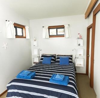 White Beach House | Larus Waterfront Cottage