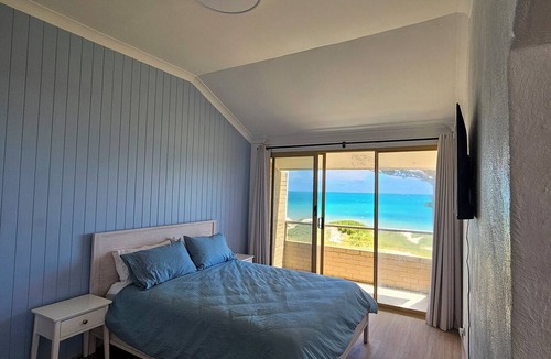 Ledge Point House | Oceanfront retreat with breathtaking views steps from the shore.