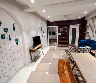 Durgapura House | One Uptown 203 modern 1 BHK loft