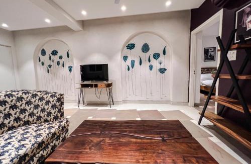Durgapura House | One Uptown 203 modern 1 BHK loft