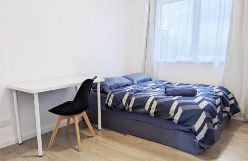 Oak Park Villa | PROMO! Entire 2 Bedroom Unit Near Train Station! Free Parking & Wifi!