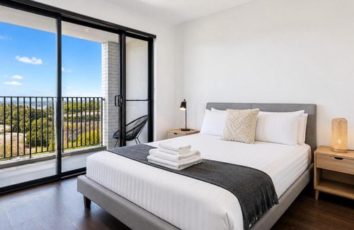 Lidcombe Apartment | Spacious Pool Retreat with Gym Pool BBQ Rooftop