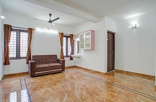 Kovalam Hotel | SPOT ON Lavender Rooms & Homestay