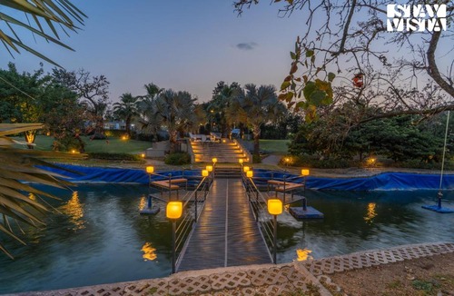 Gurugram Villa | StayVista at Kaimalgarh Aravalli Estate with Pool, Lake & views of Aravalli Hills