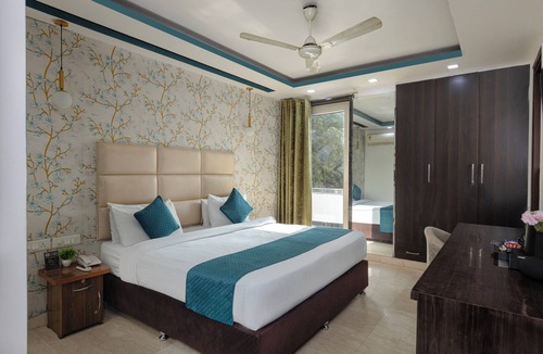 Kalkaji Hotel | The Bed and Rock