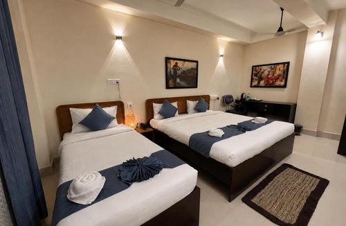 Sualkuchi Hotel | The Happy Nest- A Boutique Stay only 7 mins from Nemcare, Apollo, Physicswalla, Allen