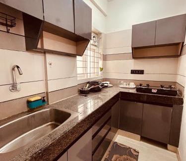 Palm Meadows Apartment | Tranquil 1BHK - Ideal for Couples & Travellers