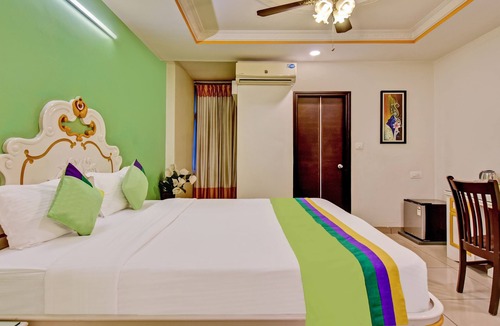 Nagavara Hotel | Treebo Premium Raj Elegance Manyata Tech Park