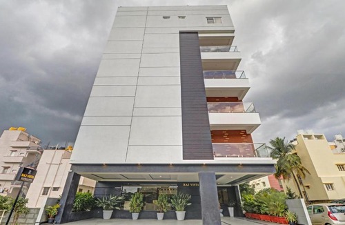 RR Nagar Hotel | Treebo Premium Raj Vista Global Village