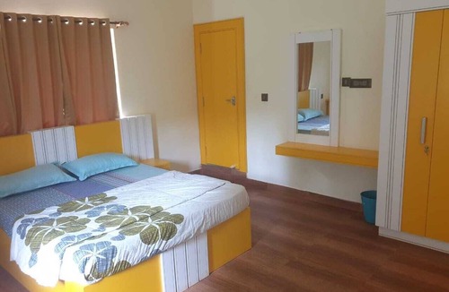 Manchalli Bed & Breakfast | Tropical Blooms - Coorg