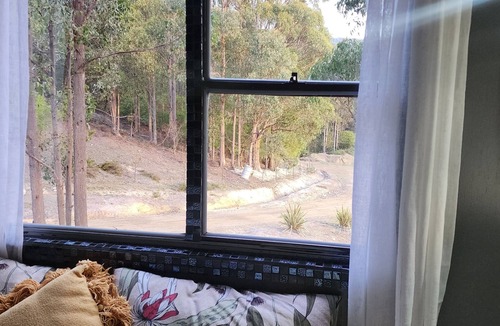 Southern Apartment | Unique, Exciting Bus Located on 63 acres with a Cosy woodheater. Luxury.