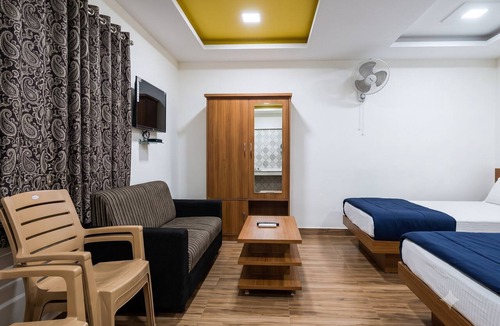 Valparai Hotel | Vasu Inn - Rooms in Valparai