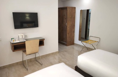 Hoysala Nagar Hotel | X by Bloom - Indiranagar