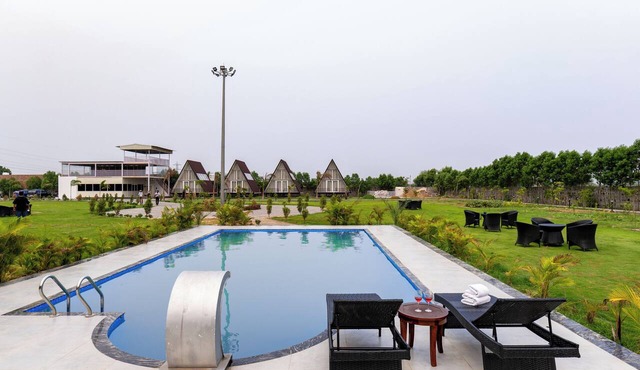 Alaya Stays Malik Farms Wooden Cottages in Faridabad