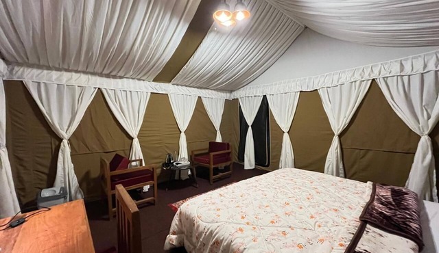 Camp OM Riverside Retreat in Pokhri