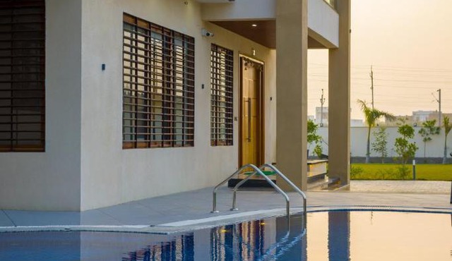 ELIVAAS Signature Lush Haven 4 BHK Villa Private Pool, Terrace & Landscaped Garden