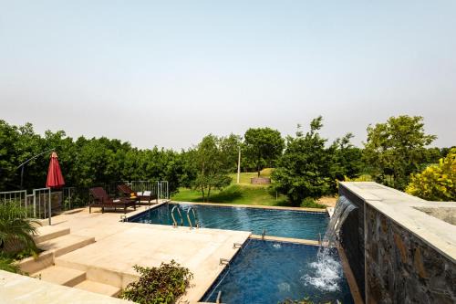 ELIVAAS Signature Stone Age home 4-BHK Stone-Clad Villa with Private Pool, Terrace Garden & Gazebo