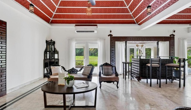 SaffronStays Acres by the Sea in Ullāl