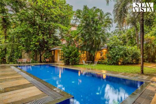StayVista at Villa Nimaya with Lawn & Pool in Saligao