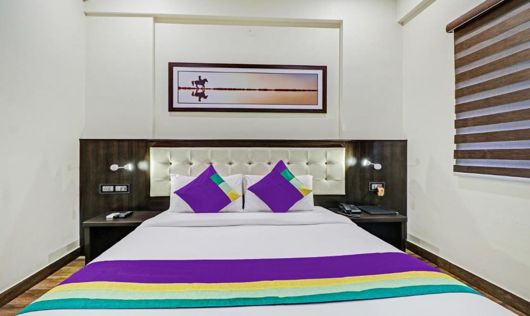 RR Nagar Hotel | Treebo Premium Raj Vista Global Village