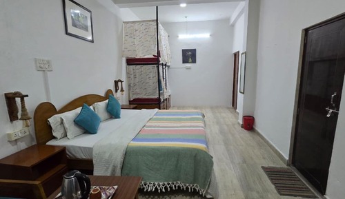 Deluxe Quad Room