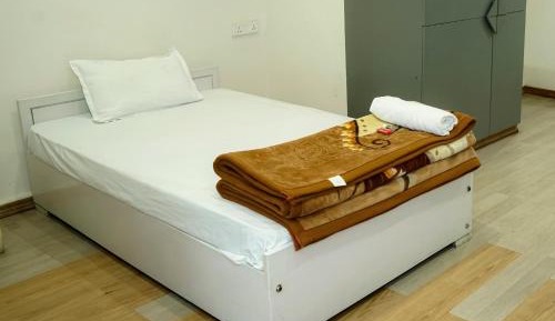 Single Bed in Dormitory Room